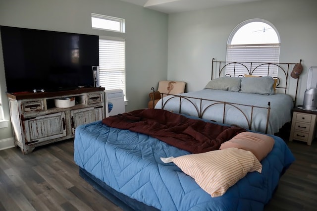 bedroom featuring dark hardwood / wood-style floors