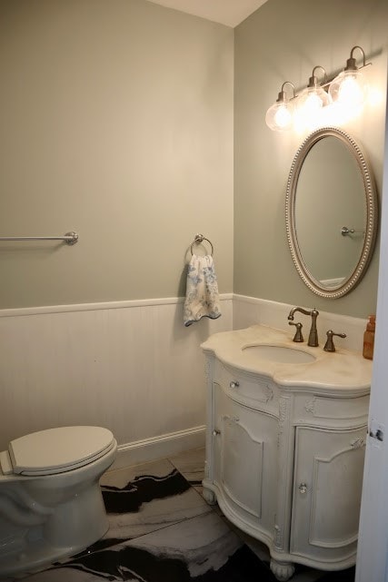 bathroom featuring vanity and toilet