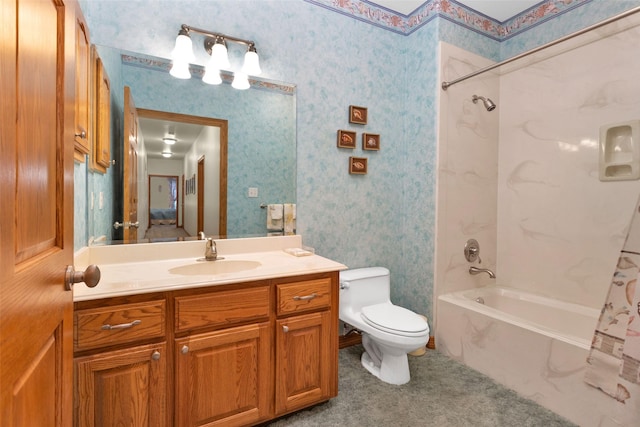 full bath with toilet, wallpapered walls, shower / washtub combination, and vanity