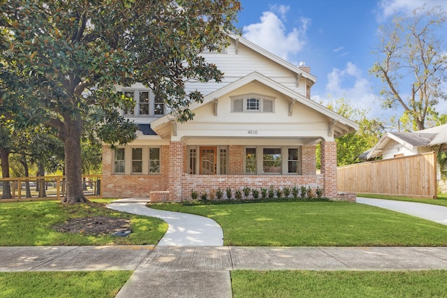 view of front of property with a front lawn