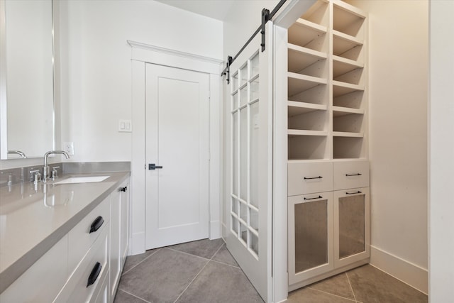 bathroom featuring sink and tile patterned floors