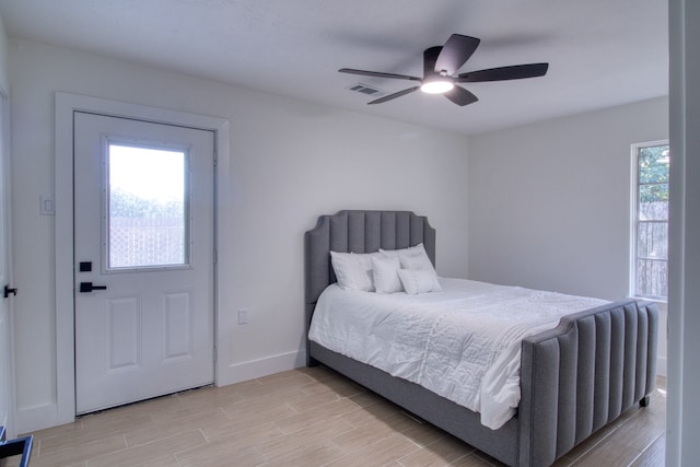 bedroom featuring light hardwood / wood-style flooring and ceiling fan