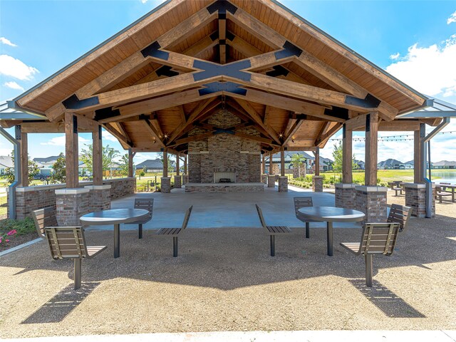 view of property's community featuring a patio and a gazebo