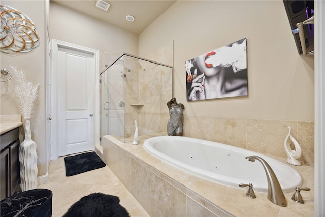 bathroom featuring separate shower and tub, tile patterned flooring, and vanity