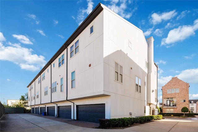 view of building exterior featuring a garage