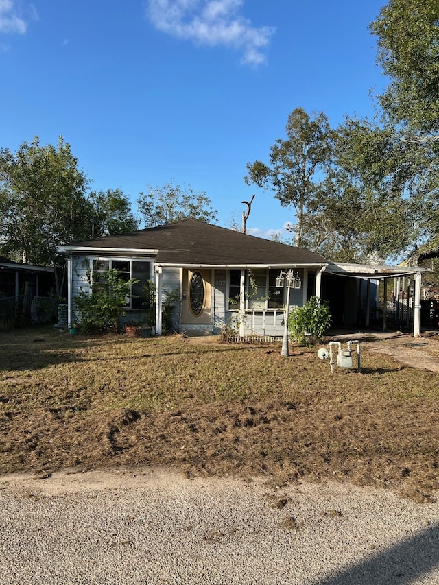 view of front of house with a carport