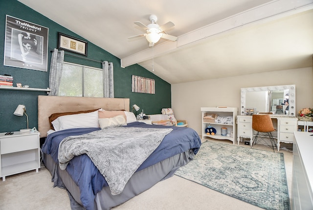 bedroom featuring ceiling fan, vaulted ceiling with beams, and light colored carpet