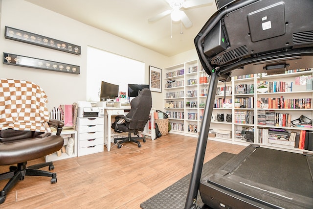 office area with light hardwood / wood-style floors and ceiling fan