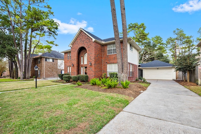 view of front facade featuring a garage and a front yard