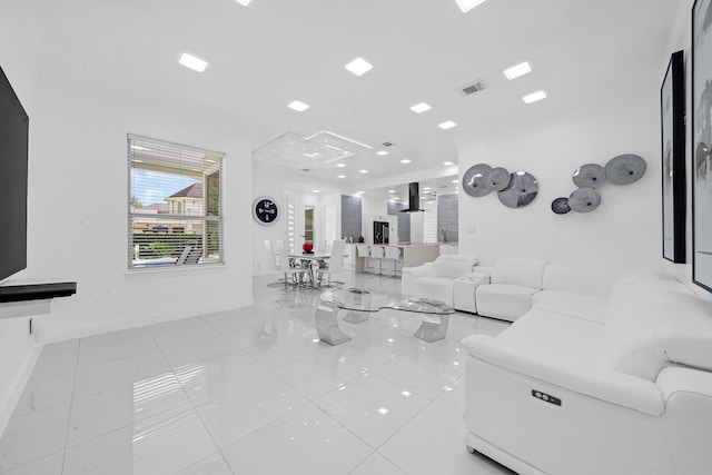 living room with light tile patterned floors