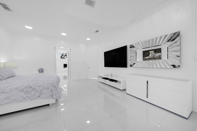 bedroom with light tile patterned flooring