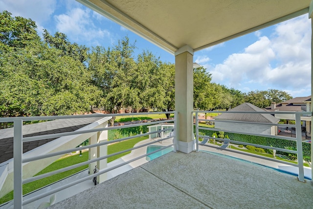 view of patio / terrace with a balcony