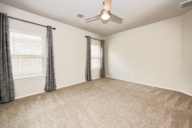 9291 Inland Leather Ln, Conroe, TX 77385 - carpeted empty room featuring a ceiling fan and baseboards