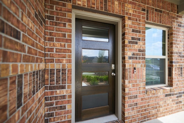 9291 Inland Leather Ln, Conroe, TX 77385 - property entrance featuring brick siding