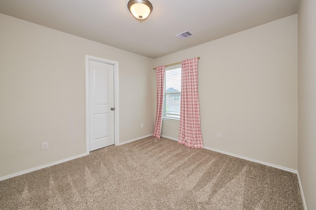 9291 Inland Leather Ln, Conroe, TX 77385 - carpeted empty room with baseboards