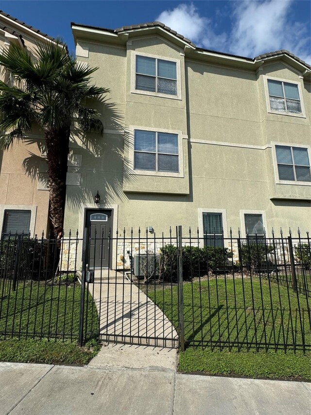 view of side of home featuring a lawn