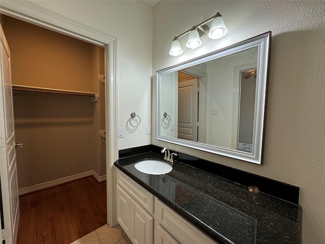 bathroom featuring vanity and tile patterned flooring