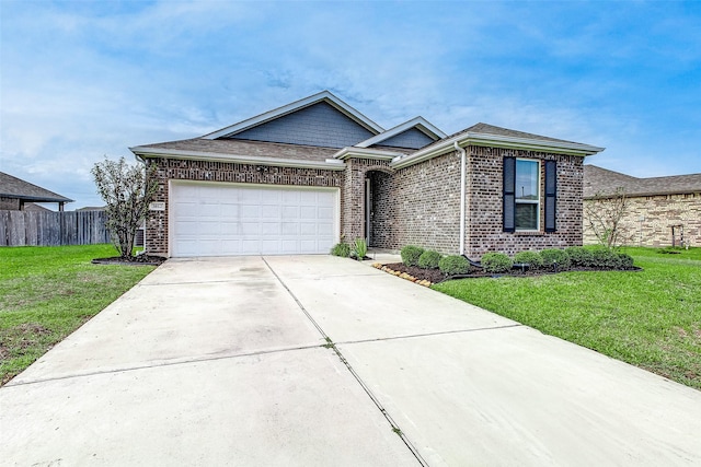 view of front facade featuring a front yard and a garage