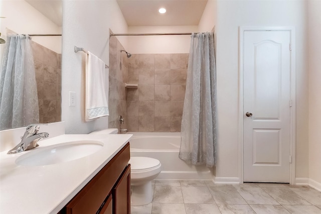 full bathroom with tile patterned flooring, shower / bath combo, toilet, and vanity