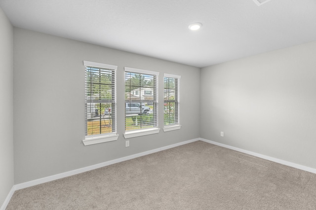 view of carpeted spare room