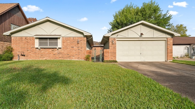 view of front facade with a garage and a front yard