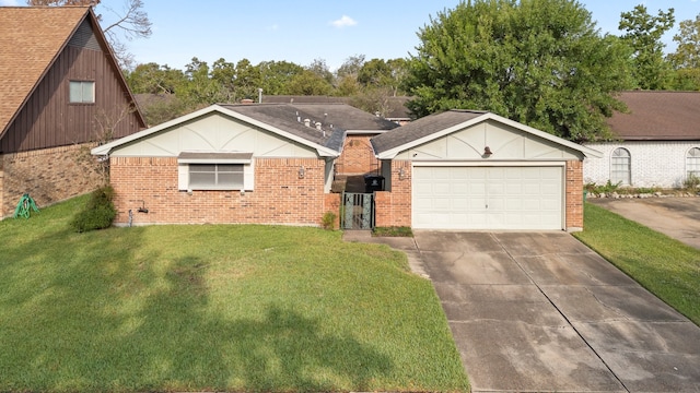 view of front of home with a garage and a front yard