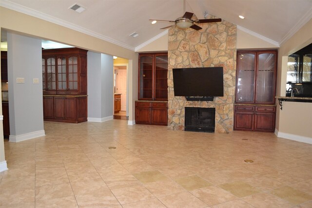 unfurnished living room with a fireplace, ceiling fan, vaulted ceiling with beams, and crown molding