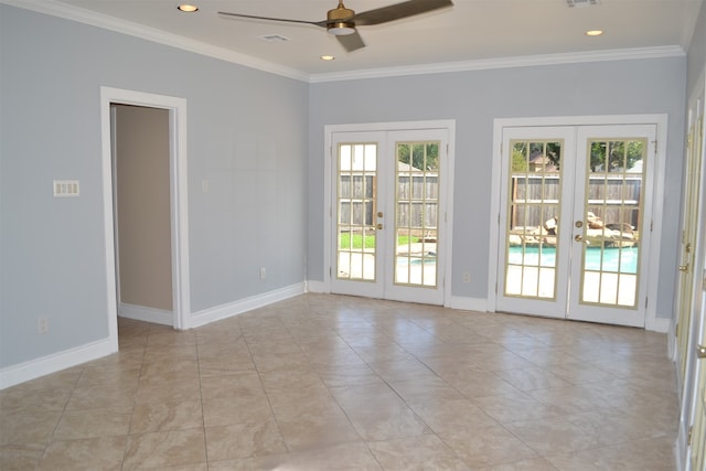 tiled empty room featuring ornamental molding, french doors, and ceiling fan