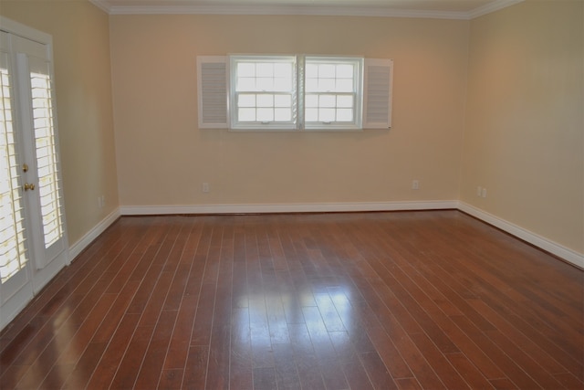 unfurnished room featuring ornamental molding, french doors, and dark hardwood / wood-style floors