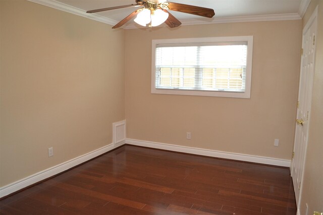 empty room featuring ornamental molding, dark hardwood / wood-style flooring, and ceiling fan