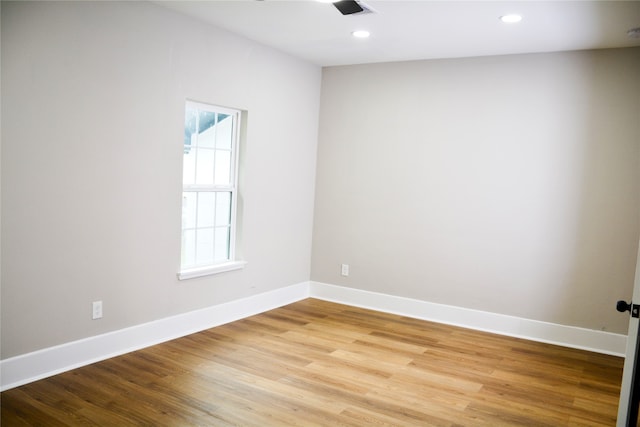 unfurnished room featuring light wood-type flooring