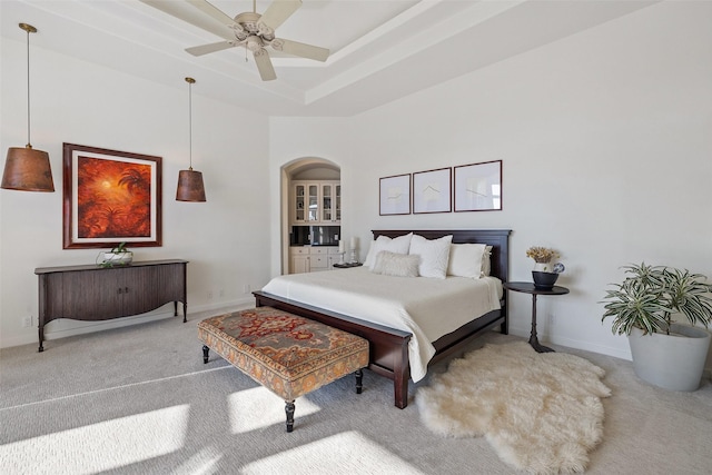 bedroom with ceiling fan and carpet flooring