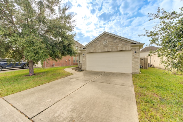 view of front facade featuring a garage and a front yard