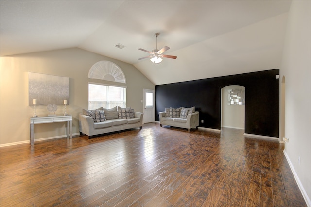 living room with ceiling fan, vaulted ceiling, and dark hardwood / wood-style floors