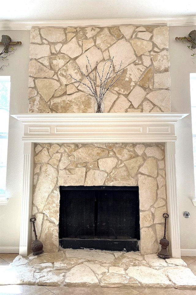 details featuring a fireplace and ornamental molding