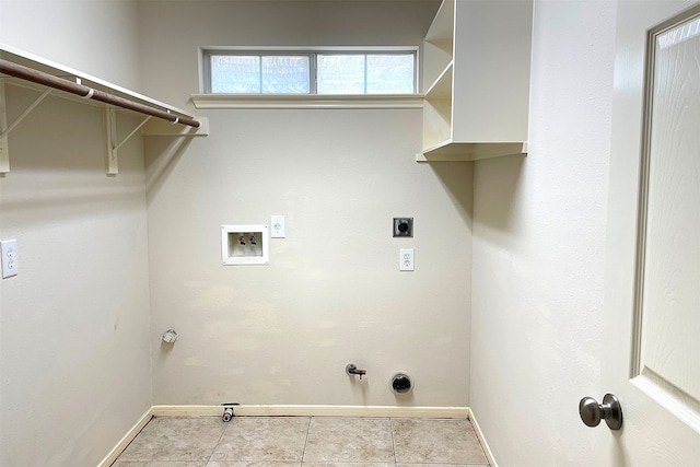 washroom featuring washer hookup, light tile patterned flooring, electric dryer hookup, and hookup for a gas dryer