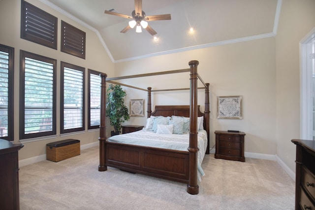 bedroom featuring ceiling fan, light colored carpet, lofted ceiling, and ornamental molding