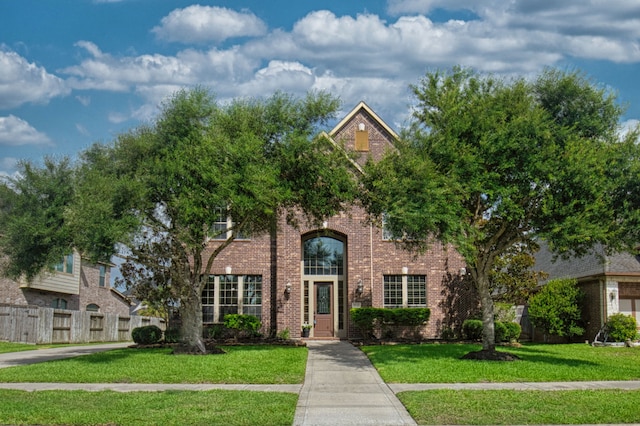 view of front of home featuring a front lawn