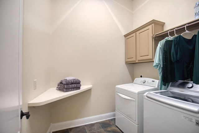 washroom with cabinets and independent washer and dryer