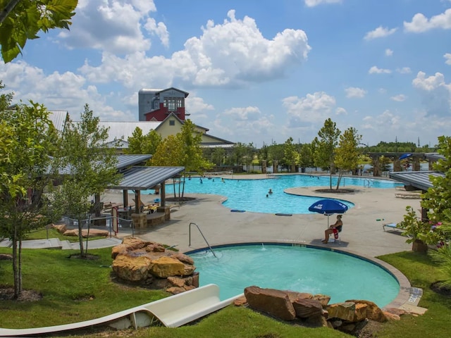 view of swimming pool with a gazebo and a patio