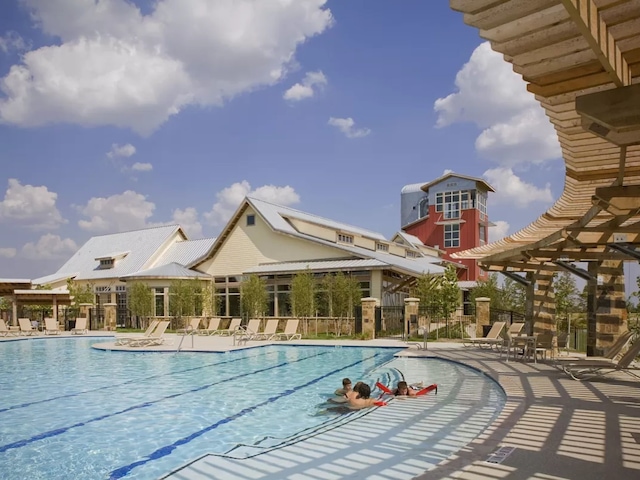 view of pool featuring a patio