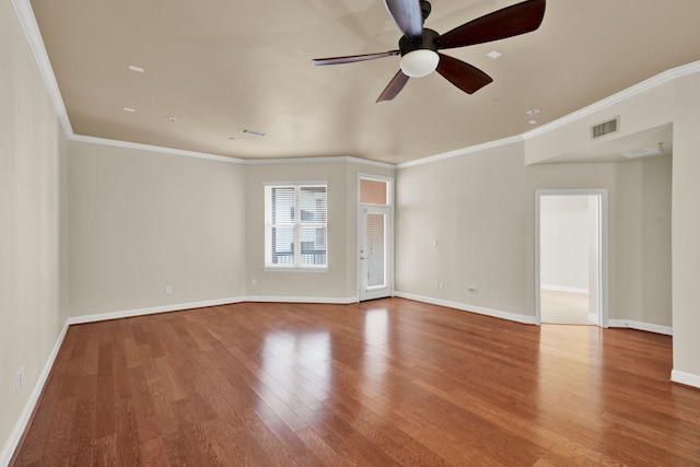 unfurnished room with wood-type flooring, ceiling fan, and crown molding