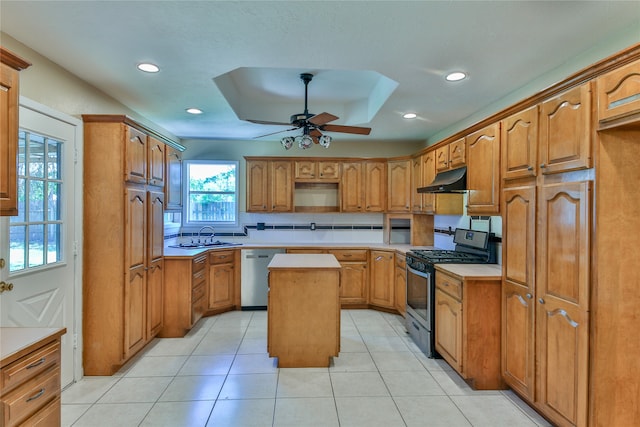 kitchen with a center island, black gas range, dishwasher, light tile patterned floors, and ceiling fan