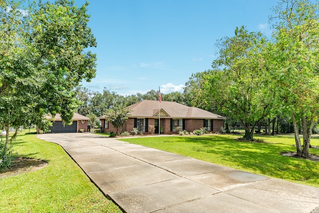 single story home with a garage and a front yard