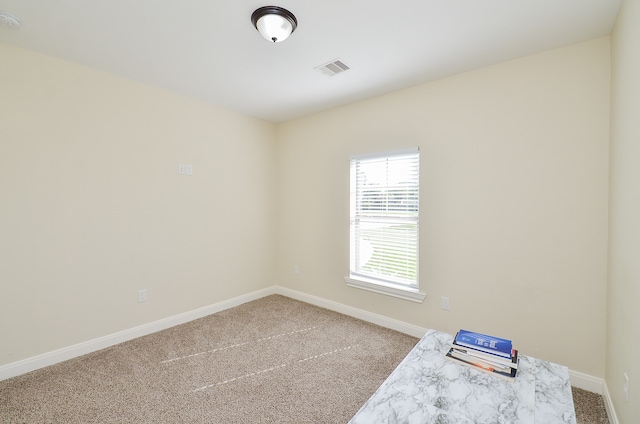 empty room featuring carpet