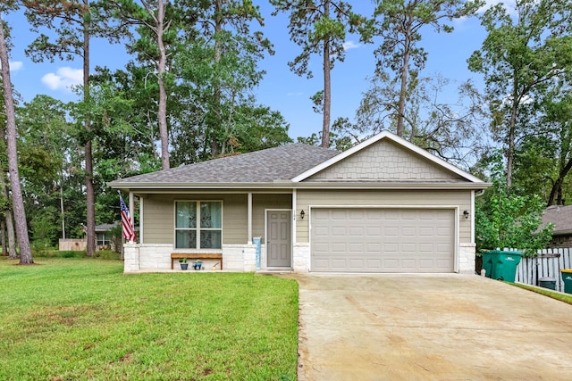 view of front of property with a garage and a front yard