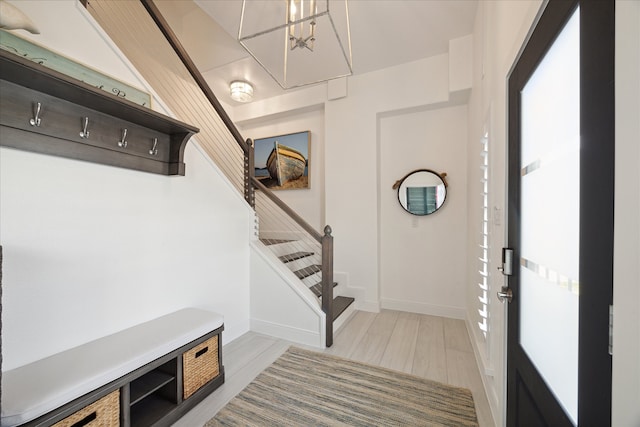 entryway with light hardwood / wood-style floors