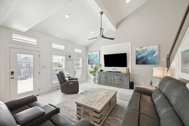 living room featuring beamed ceiling, high vaulted ceiling, and ceiling fan