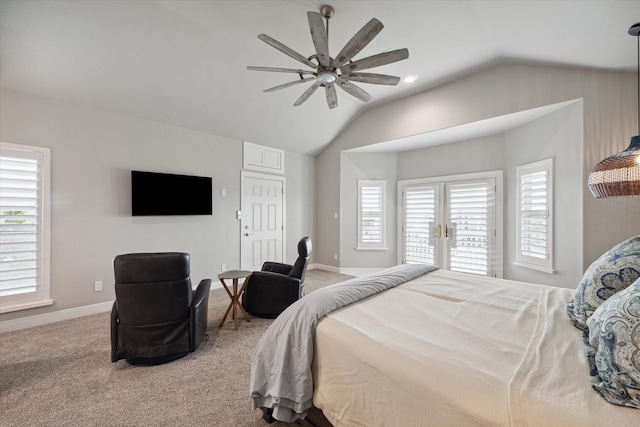 carpeted bedroom featuring multiple windows, french doors, ceiling fan, and lofted ceiling