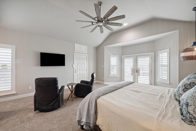 1335 Outrigger, Tiki Island, TX 77554 - carpeted bedroom with vaulted ceiling, multiple windows, a ceiling fan, and baseboards